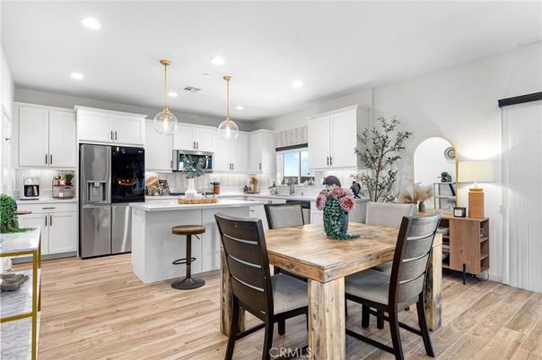 Dining room, Interior, Kitchen, Pendant Lights, Recessed Lighting, Stainless Steel Appliances, Wood Texture Flooring