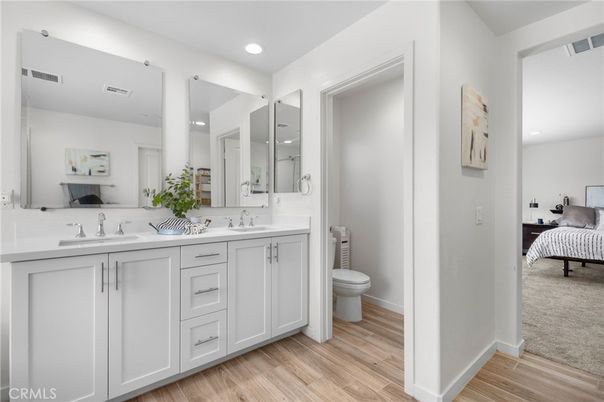 Bathroom, Bedroom, Dual Sink Vanities, Interior, Recessed Lighting, Wood Texture Flooring