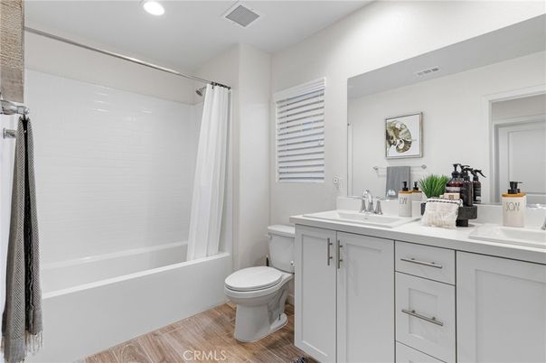 Bathroom, Dual Sink Vanities, Interior, Recessed Lighting, Wood Texture Flooring