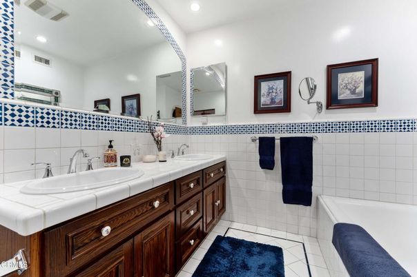 Bathroom, Dual Sink Vanities, Interior, Recessed Lighting, Tile Countertops