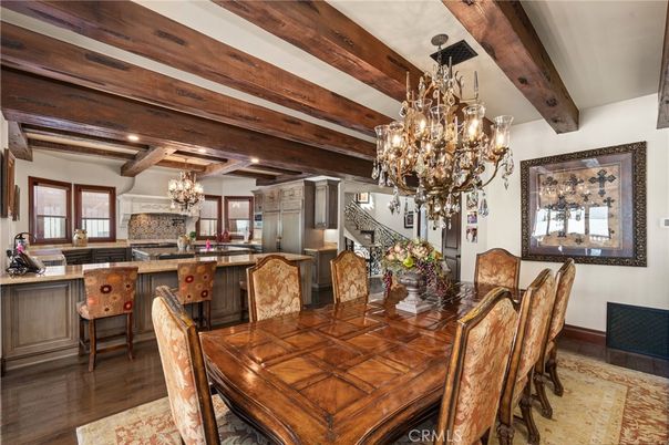 Chandelier, Dining room, Interior, Kitchen, Recessed Lighting, Stainless Steel Appliances, Wooden Beams, Wood Texture Flooring