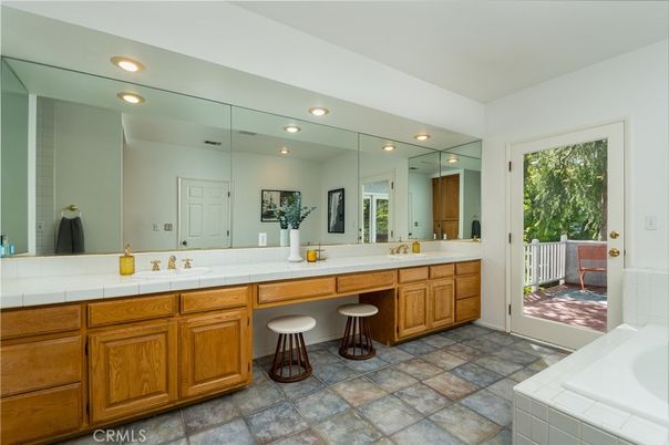 Bathroom, Dual Sink Vanities, Interior, Recessed Lighting, Tile Countertops