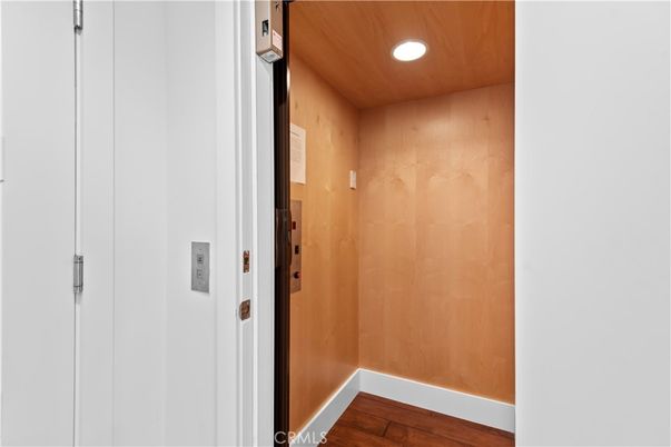 Elevator, Interior, Recessed Lighting, Wooden Ceilings, Wood Texture Flooring, Wooden Walls