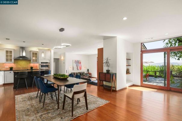 Dining room, Interior, Kitchen, Pendant Lights, Recessed Lighting, Stainless Steel Appliances, Wood Texture Flooring