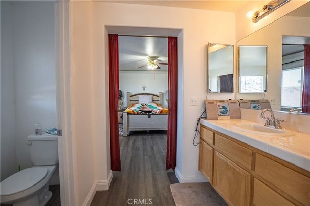 Bathroom, Dual Sink Vanities, Interior, Tile Countertops, Wood Texture Flooring
