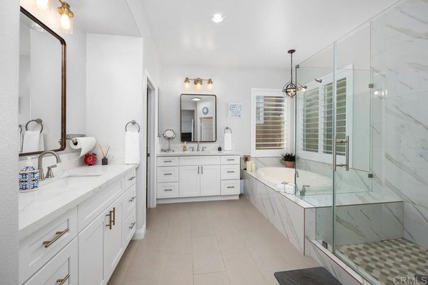 Bathroom, Dual Sink Vanities, Glass Shower, Interior, Marble Walls, Pendant Lights, Recessed Lighting