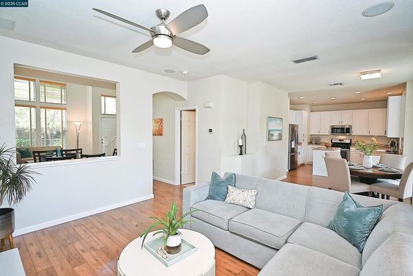 Dining room, Interior, Kitchen, Living room, Recessed Lighting, Stainless Steel Appliances, Wood Texture Flooring