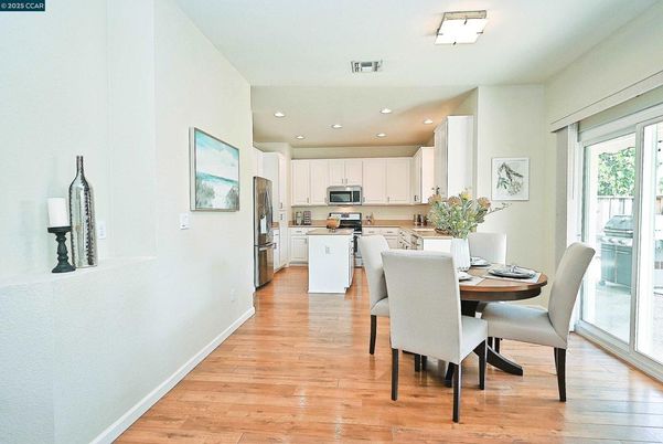 Dining room, Interior, Kitchen, Recessed Lighting, Stainless Steel Appliances, Wood Texture Flooring