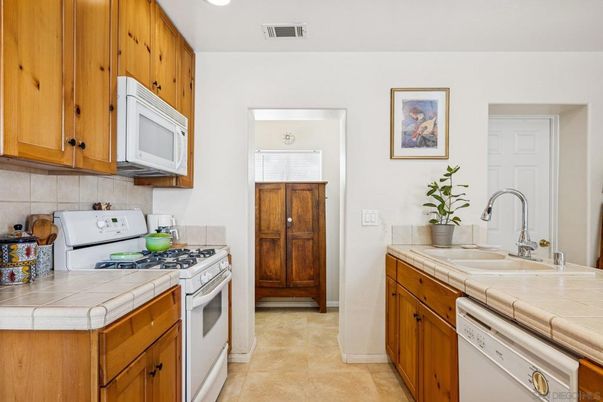 Interior, Kitchen, Recessed Lighting, Tile Countertops