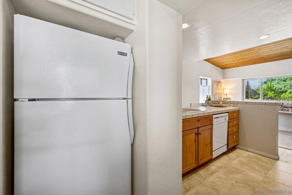 Interior, Kitchen, Recessed Lighting, Tile Countertops, Wooden Ceilings