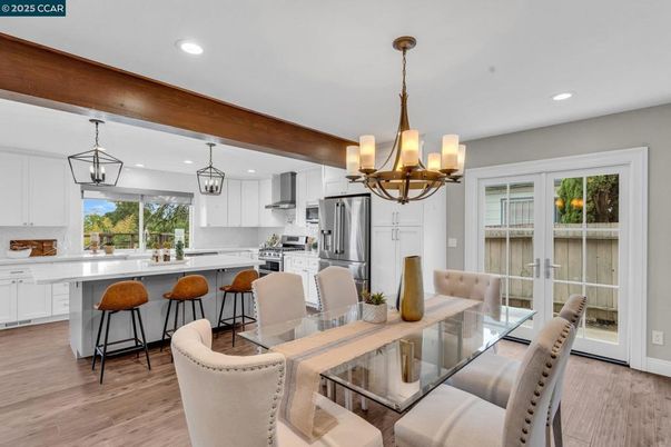 Chandelier, Dining room, Interior, Kitchen, Pendant Lights, Recessed Lighting, Stainless Steel Appliances, Wooden Beams, Wood Texture Flooring