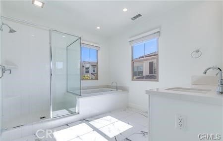 Bathroom, Dual Sink Vanities, Glass Shower, Interior, Marble, Recessed Lighting