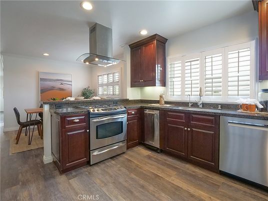Dining room, Interior, Kitchen, Recessed Lighting, Stainless Steel Appliances, Wood Texture Flooring