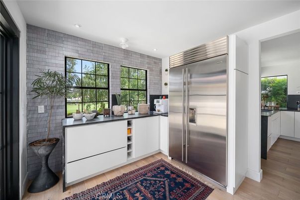 Interior, Kitchen, Recessed Lighting, Stainless Steel Appliances, Stone Walls, Wood Texture Flooring
