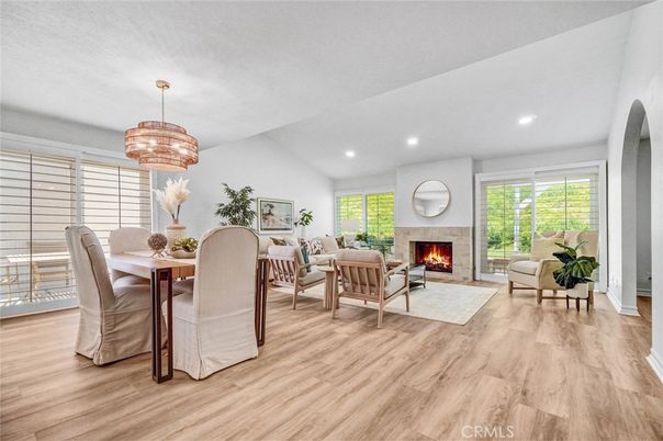Chandelier, Dining room, Fireplace, Interior, Living room, Recessed Lighting, Wood Texture Flooring