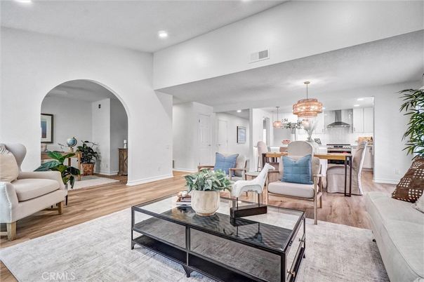 Chandelier, Dining room, Interior, Kitchen, Living room, Recessed Lighting, Stainless Steel Appliances, Wood Texture Flooring