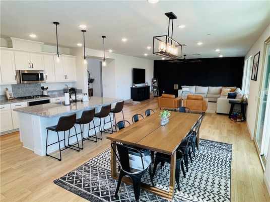 Dining room, Interior, Kitchen, Living room, Pendant Lights, Recessed Lighting, Stainless Steel Appliances, Wood Texture Flooring