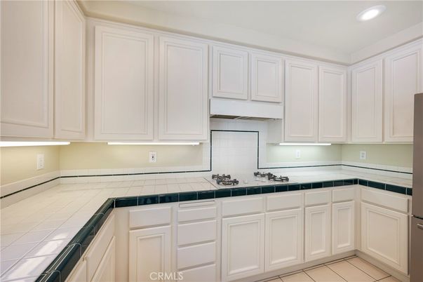 Interior, Kitchen, Recessed Lighting, Tile Countertops