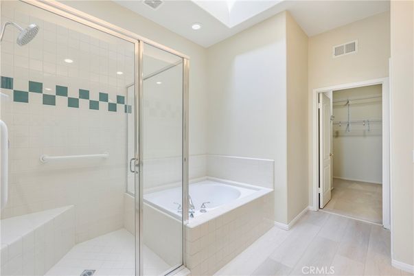 Bathroom, Glass Shower, Interior, Recessed Lighting, Walk-in Closets, Wood Texture Flooring
