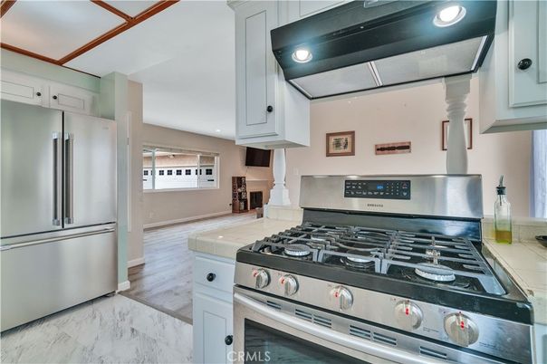 Interior, Kitchen, Marble, Recessed Lighting, Stainless Steel Appliances, Wood Texture Flooring