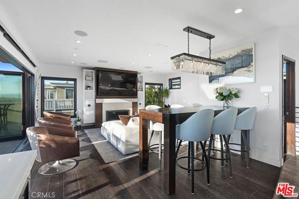 Chandelier, Dining room, Fireplace, Interior, Living room, Recessed Lighting, Wood Texture Flooring