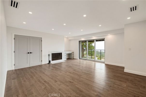 Empty room, Fireplace, Interior, Recessed Lighting, Wood Texture Flooring