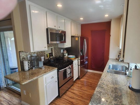 Interior, Kitchen, Recessed Lighting, Stainless Steel Appliances, Wood Texture Flooring