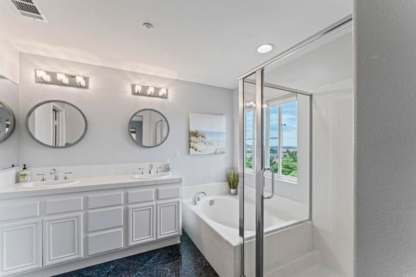 Bathroom, Dual Sink Vanities, Glass Shower, Interior, Recessed Lighting, Tile Countertops