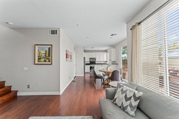 Dining room, Interior, Kitchen, Living room, Recessed Lighting, Stainless Steel Appliances, Wood Texture Flooring