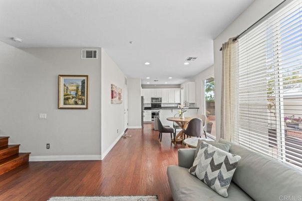 Dining room, Interior, Kitchen, Living room, Recessed Lighting, Stainless Steel Appliances, Wood Texture Flooring