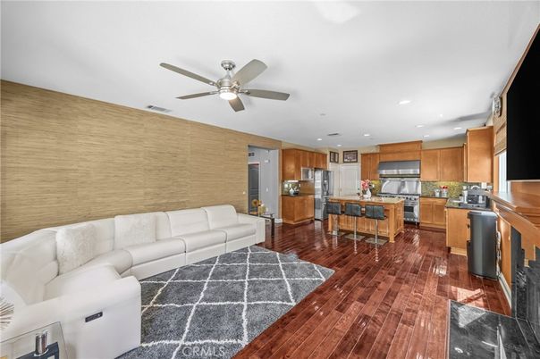 Dining room, Interior, Kitchen, Living room, Recessed Lighting, Stainless Steel Appliances, Wood Texture Flooring