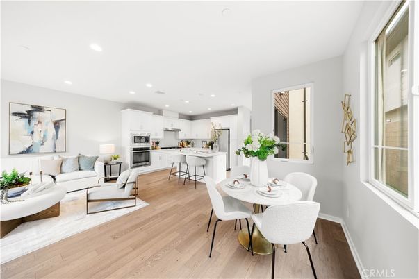 Dining room, Interior, Kitchen, Living room, Recessed Lighting, Stainless Steel Appliances, Wood Texture Flooring