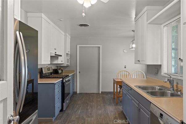Dining room, Interior, Kitchen, Pendant Lights, Stainless Steel Appliances, Wood Texture Flooring