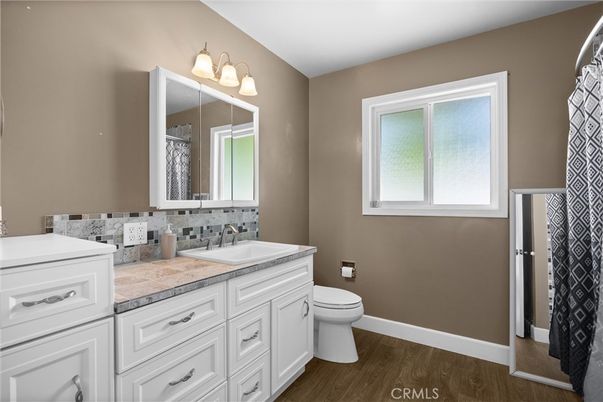 Bathroom, Dual Sink Vanities, Interior, Tile Countertops, Wood Texture Flooring