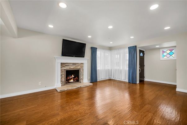 Empty room, Fireplace, Interior, Recessed Lighting, Wood Texture Flooring