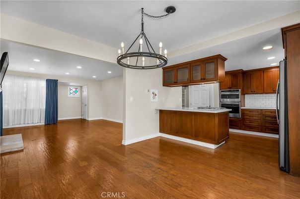 Chandelier, Interior, Kitchen, Recessed Lighting, Stainless Steel Appliances, Wood Texture Flooring