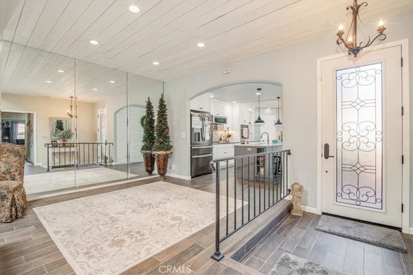 Chandelier, Interior, Kitchen, Pendant Lights, Recessed Lighting, Stainless Steel Appliances, Wood Texture Flooring