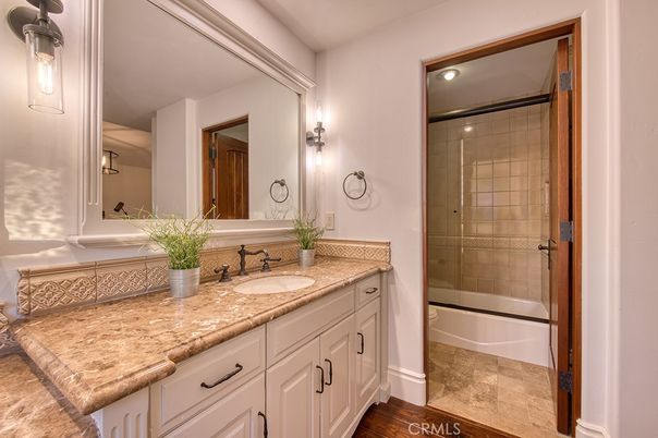 Bathroom, Dual Sink Vanities, Glass Shower, Interior, Wood Texture Flooring