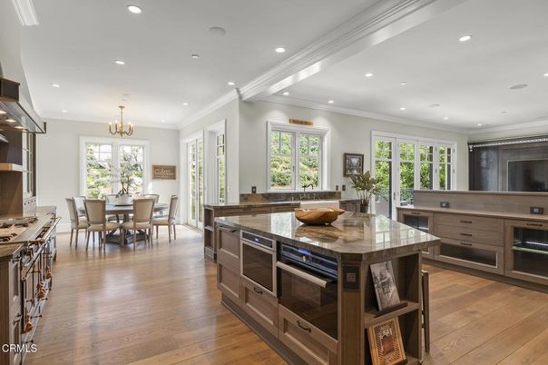 Chandelier, Dining room, Interior, Kitchen, Recessed Lighting, Stainless Steel Appliances, Wood Texture Flooring
