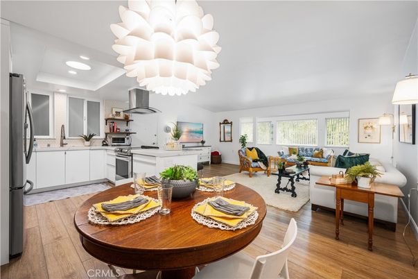 Chandelier, Dining room, Interior, Kitchen, Living room, Recessed Lighting, Stainless Steel Appliances, Wood Texture Flooring