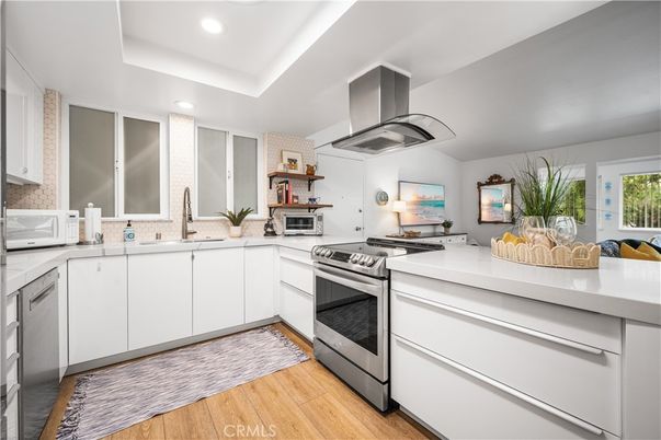 Interior, Kitchen, Recessed Lighting, Stainless Steel Appliances, Wood Texture Flooring