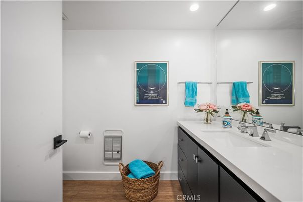 Bathroom, Dual Sink Vanities, Interior, Recessed Lighting, Wood Texture Flooring
