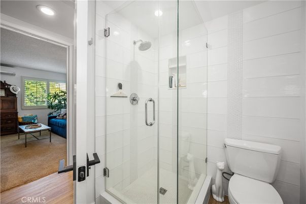 Bathroom, Glass Shower, Interior, Recessed Lighting, Wood Texture Flooring
