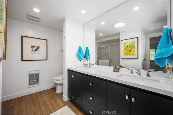 Bathroom, Dual Sink Vanities, Interior, Recessed Lighting, Wood Texture Flooring