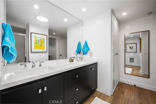 Bathroom, Dual Sink Vanities, Interior, Recessed Lighting, Wood Texture Flooring