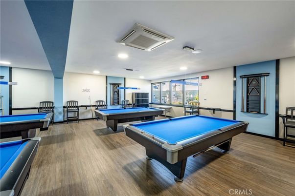 Billiard Table, Fitness Equipment, Game Room, Interior, Recessed Lighting, Wood Texture Flooring