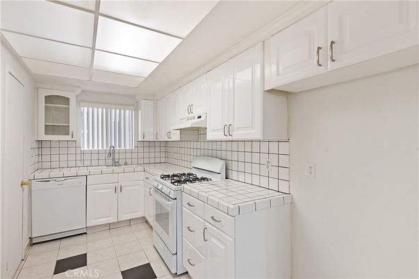 Interior, Kitchen, Tile Countertops, Washer