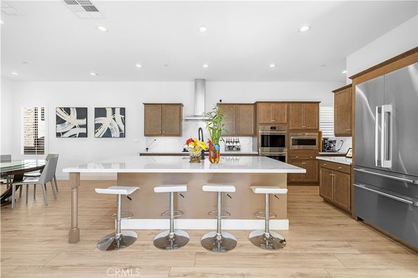 Dining room, Interior, Kitchen, Recessed Lighting, Stainless Steel Appliances, Wood Texture Flooring