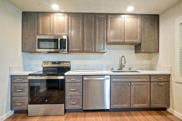 Interior, Kitchen, Recessed Lighting, Stainless Steel Appliances, Wood Texture Flooring