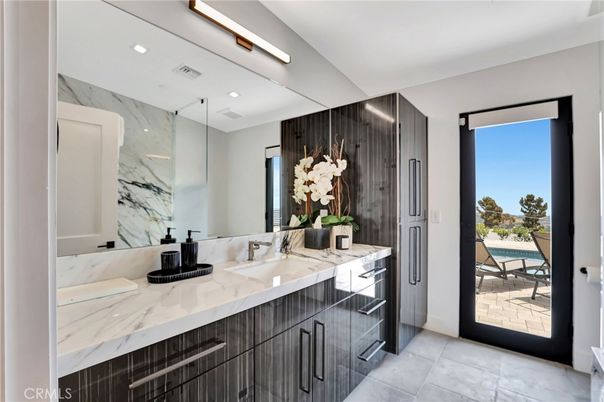 Bathroom, Dual Sink Vanities, Interior, Marble Walls, Recessed Lighting
